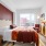 natural lighting pours through large picture window in bedroom
