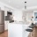 large island and under cabinet lighting in open kitchen