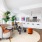 sun-filled living room open to kitchen